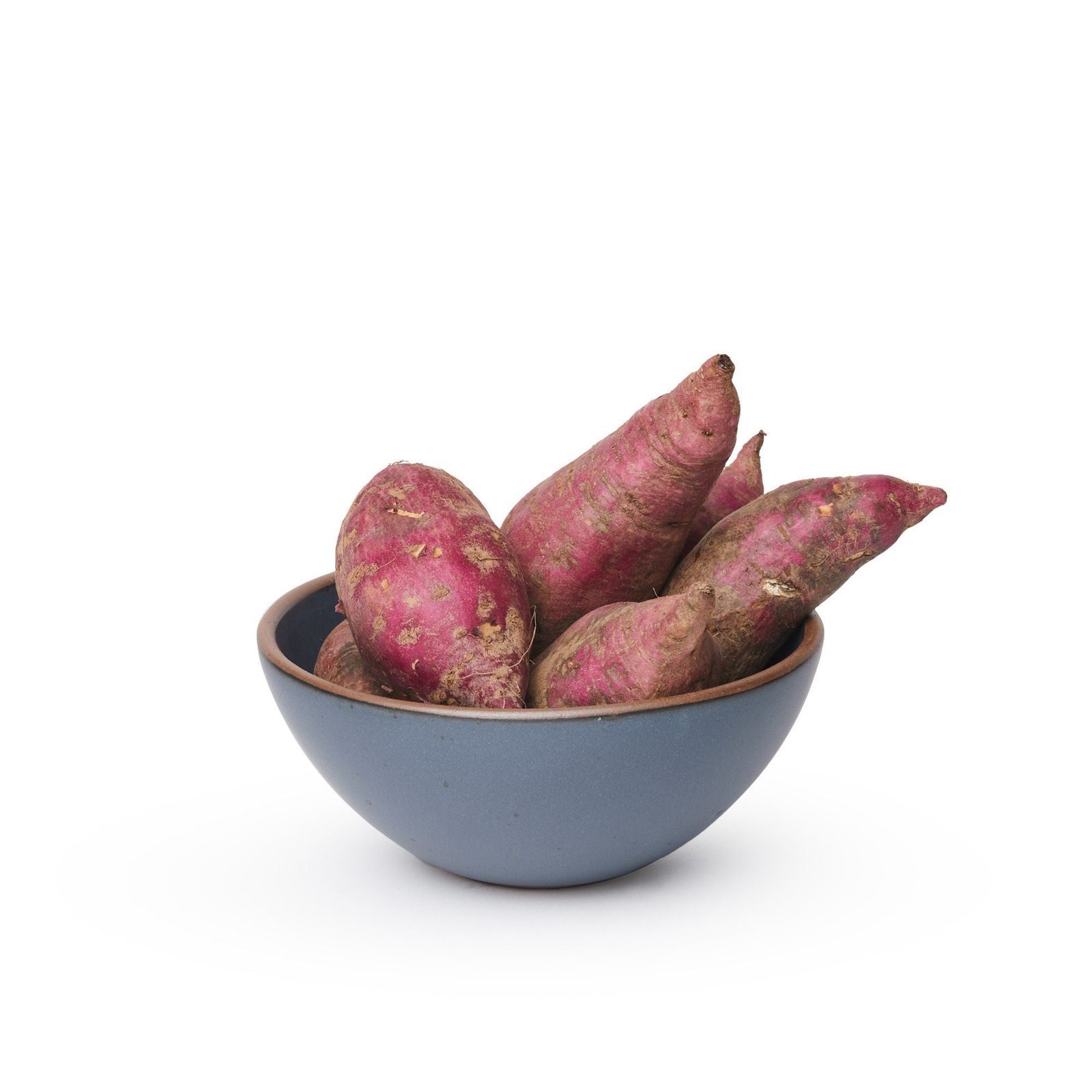 Lunessia soup bowl in Deep Cobalt, shown with sweet potatoes